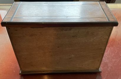 Wooden mail box closed by a cylinder with...