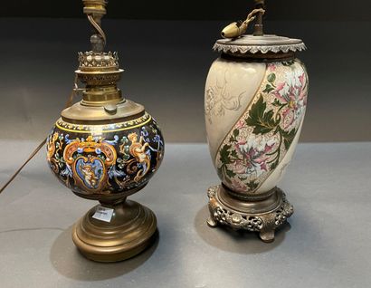 Two ceramic lamp bases, one with grotesque...