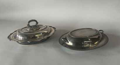 Two silver-plated vegetable dishes.
English...