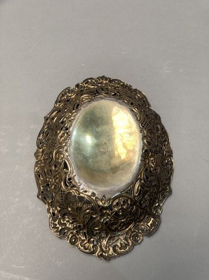 Openwork silver basket with floral design....