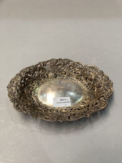 Openwork silver basket with floral design....