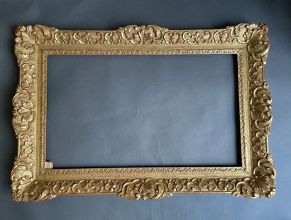 A berain frame in gilded wood carved with...