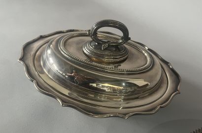 Two silver-plated vegetable dishes.
English...