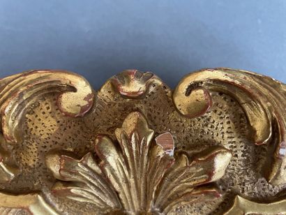 A berain frame in gilded wood carved with...