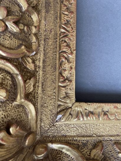 A berain frame in gilded wood carved with...