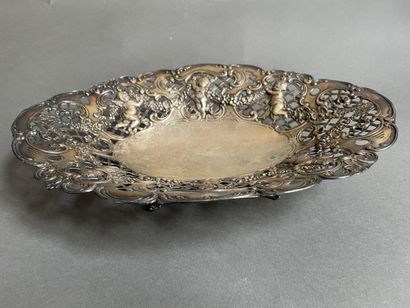 Oval silver basket, chased with lilies holding...