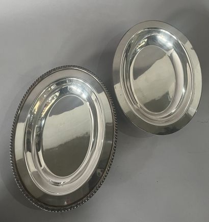 Two silver-plated vegetable dishes.
English...