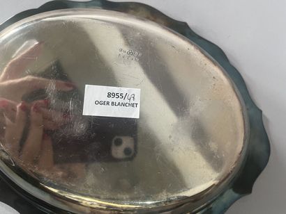 Two silver-plated vegetable dishes.
English...
