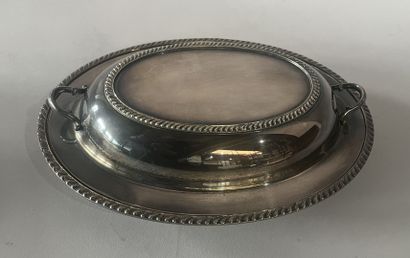 Two silver-plated vegetable dishes.
English...