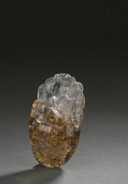 CHINE - Moderne
Guanyin assise et tenant...