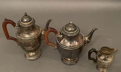 Théière, cafetière et pot à lait en argent...