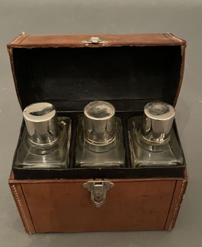 Étui à flacons de parfum en cuir havane accueillant...