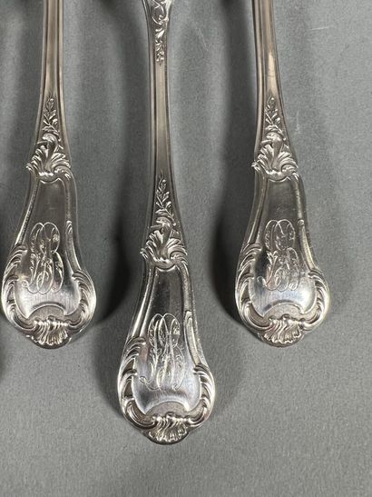Dix couverts en argent ciselé de motif feuillagé,...