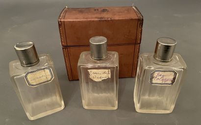 Étui à flacons de parfum en cuir havane accueillant...