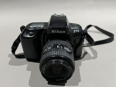 Two cameras including a NIKON F70 and a PANASONIC...
