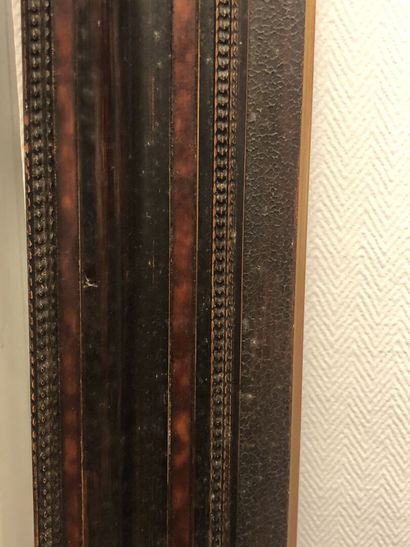 Wood frame with imitation tortoiseshell molding
Ext:...