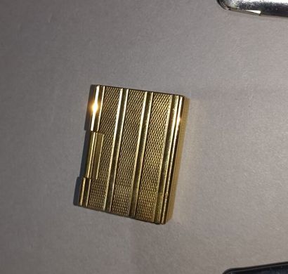 Set of three lighters, one of which is DUPONT,...