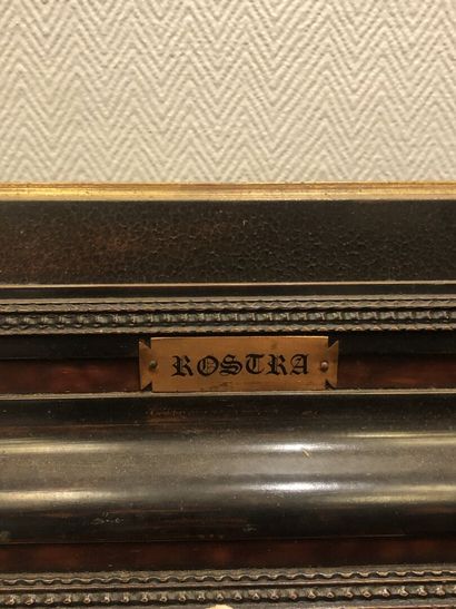Wood frame with imitation tortoiseshell molding
Ext:...