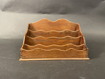 Wooden letter holder with four compartments.
24...