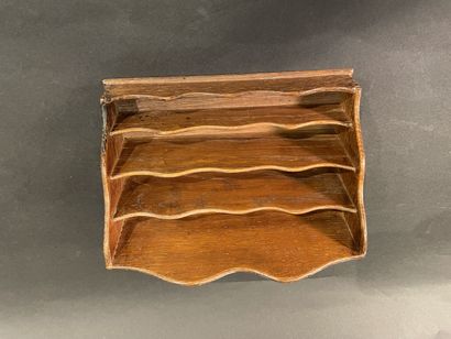 Wooden letter holder with four compartments.
24...