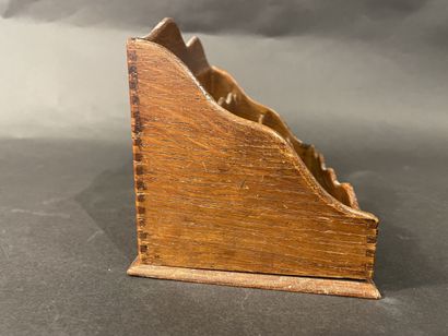 Wooden letter holder with four compartments.
24...