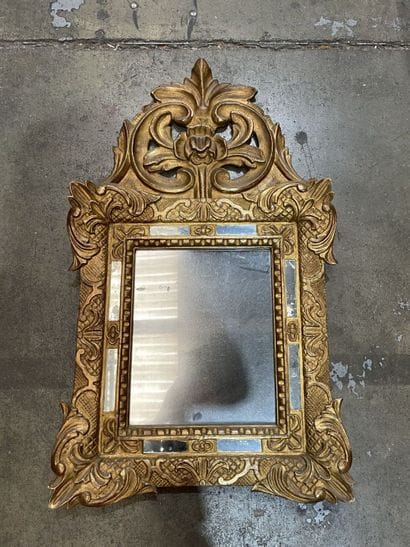 Small giltwood mirror carved with a flowery...