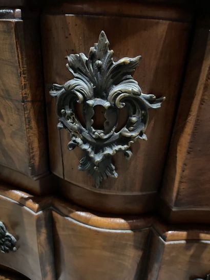 Stained wood chest of drawers, crossbow front,...