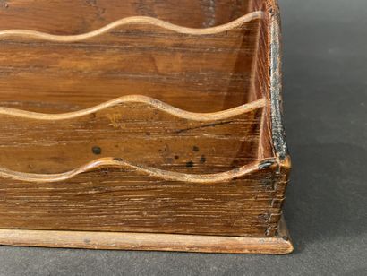 Wooden letter holder with four compartments.
24...
