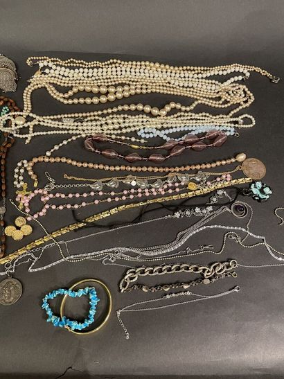 Large lot of costume jewelry including rings,...
