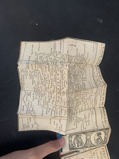Small almanac bound in red morocco centered...
