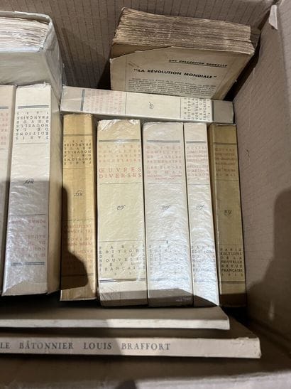 Bound and paperback books.
Eight boxes.