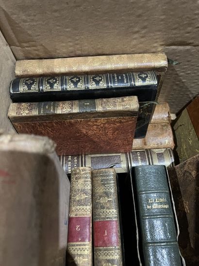 Bound and paperback books.
Eight boxes.
