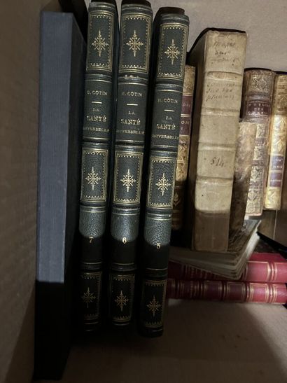 Bound and paperback books.
Eight boxes.