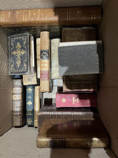 Bound and paperback books.
Eight boxes.