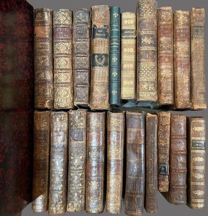 Bound and paperback books. 
4 boxes