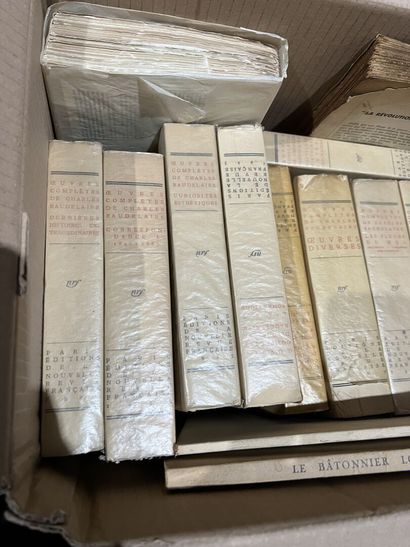 Bound and paperback books.
Eight boxes.