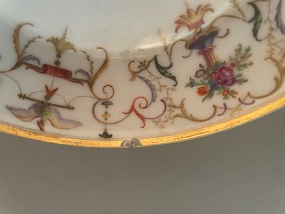 Service tête à tête en porcelaine à décor...