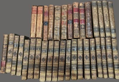 Bound and paperback books. 
4 boxes