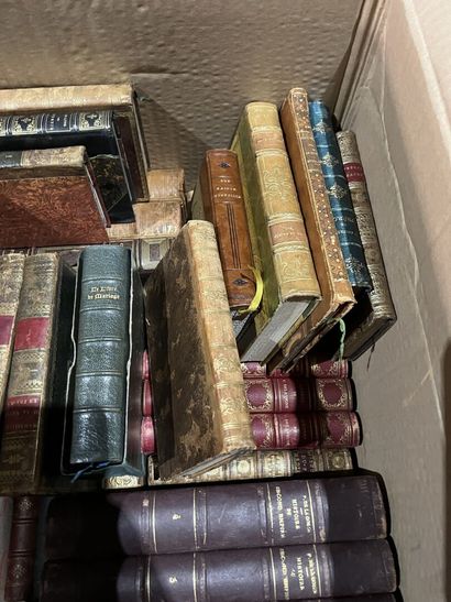 Bound and paperback books.
Eight boxes.