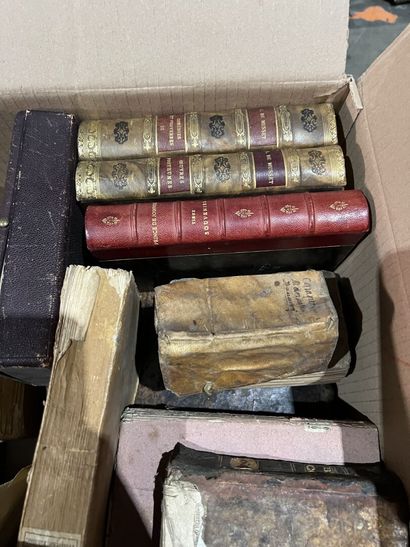 Bound and paperback books.
Eight boxes.