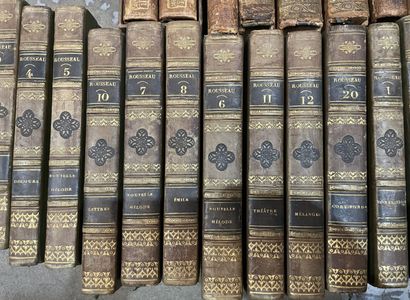 Bound and paperback books. 
4 boxes