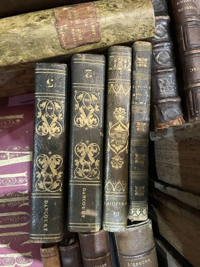 Bound and paperback books. 
4 boxes