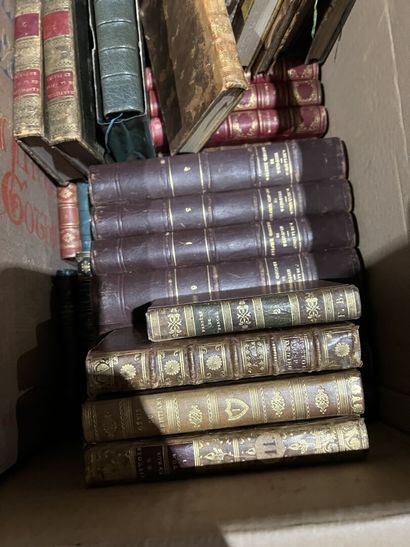Bound and paperback books.
Eight boxes.