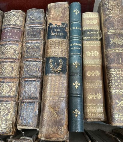Bound and paperback books. 
4 boxes