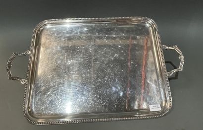 Plateau de service en métal argenté, le bord...
