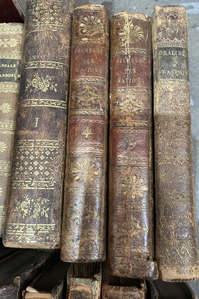 Bound and paperback books. 
4 boxes