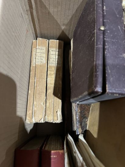 Bound and paperback books.
Eight boxes.