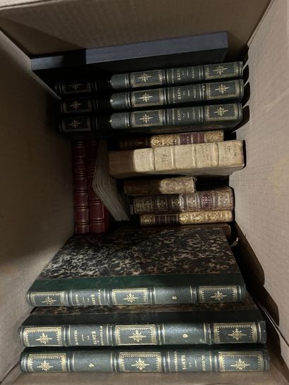 Bound and paperback books.
Eight boxes.