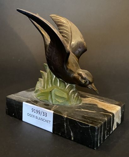 Serre-livres en bronze à patine doré et émaillé...