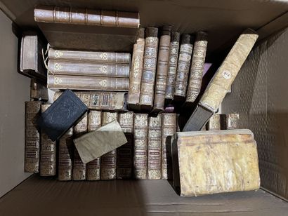 Bound and paperback books.
Eight boxes.